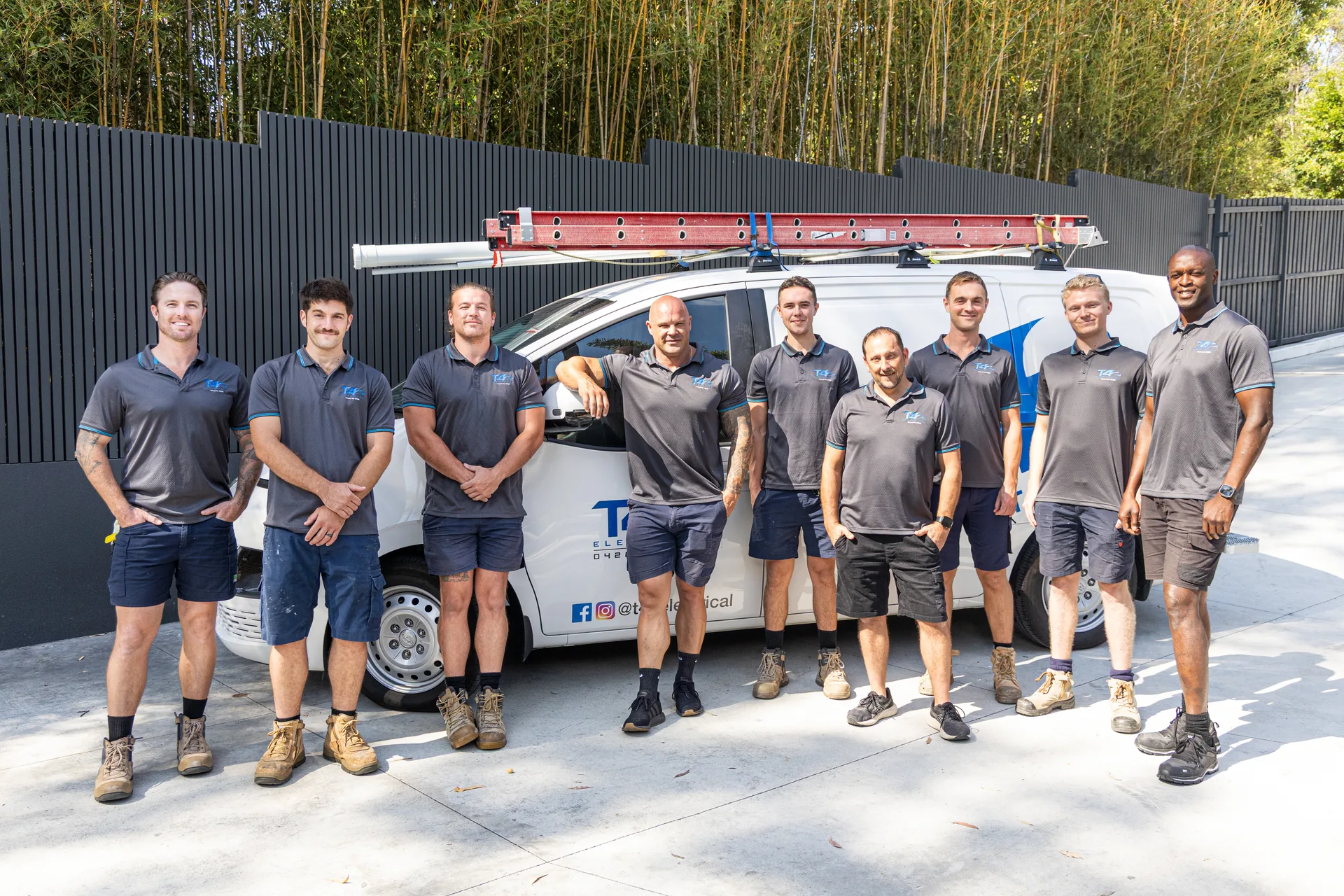 The Family Electrician Pacific Pines team with a service van